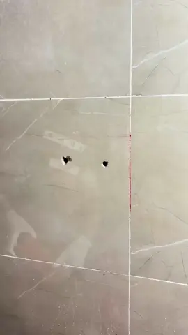 Cutting tiles to install a socket