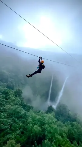 Get your adrenaline pumping with a thrilling zipline 300m in the air, as you fly above the jungle and the cascading twin waterfalls of Tad Fane right below you ⛰️🌧️ Would you try this? Tag someone that would! 📍Tad Fane, #Laos  #explore #adventure #traveltiktok  Ig: navee.sang