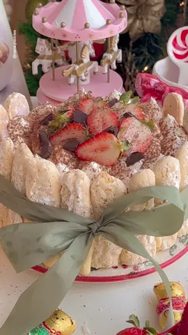 Merry christmas 🤎✨ this is THE BEST cake for christmas I swear ☕️⭐️✨ **Ladyfingers from Scratch:** *Ingredients:* - 3 large eggs, separated - ½ cup granulated sugar, divided (100g) - ½ teaspoon vanilla extract - ¼ teaspoon salt - 1 cup all-purpose flour (120g) - 5 teaspoons cornstarch - Powdered sugar for dusting *Instructions:* 1. Preheat the oven to 350°F and line two baking sheets with parchment paper. Fit a piping bag with a large round tip. 2. In a large bowl, combine egg yolks, ¼ cup sugar, vanilla, and salt. Beat until pale and fluffy. 3. In a separate bowl, beat egg whites until soft peaks form. Gradually add the remaining ¼ cup sugar while beating until thick and glossy. 4. Remix the egg yolk mixture and fold in the beaten egg whites in batches. Sift in flour and cornstarch, folding until just combined. 5. Pipe 4-inch long logs onto the baking sheets, dusting one with powdered sugar. Bake for 12-15 minutes until golden. Cool and store in an airtight container. **Tiramisù cake** *Tiramisu:* - 4 large egg yolks - ½ cup (100 grams) granulated sugar, divided - ¾ cup heavy cream - 1 cup (227 grams) mascarpone - 1¾ cups strong coffee - 2 tablespoons rum or cognac - 2 tablespoons cocoa powder - About 33 ladyfingers *Decoration (optional):* - Mix ½ cup heavy cream & ¼ cup (50 grams) sugar for the whipped cream  - Strawberries - Chocolate, for shaving *Instructions:* 1. Whip egg yolks and ¼ cup sugar until tripled. In another bowl, whip cream and remaining sugar until soft peaks form. Fold mascarpone into egg yolks. 2. Combine coffee and rum in a bowl. Dust the bottom of a 6-inch cake pan with cocoa powder. 3. Dip ladyfingers in coffee mixture and arrange on the bottom. Spread a third of mascarpone mixture. Repeat layers. 4. Refrigerate for at least 4 hours. For decoration, arrange remaining ladyfingers around the cake, pipe whipped cream on top, and add strawberries and grated chocolate. 🏷️ #tiramisù #tiramisu #tiramisucake #christmascake #coffeelover #christmas #Recipe