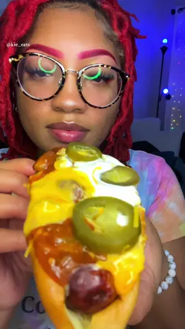 I seriously cannot have chili cheese dogs any other way! I have a jalapeño cheddar sausage, topped with chili, cheese sauce, cheddar cheese, jalapeños, sour cream, and flamin’hot ruffles. the bread is Pepperidge Farms split top hotdog buns ##asmr##chilicheesedog##hotdog##asmrtiktoks##asmrfood##notalkingmukbang##eating##fypシ##fyp##mukbang##foryou##Foodie##foodtiktok##chili