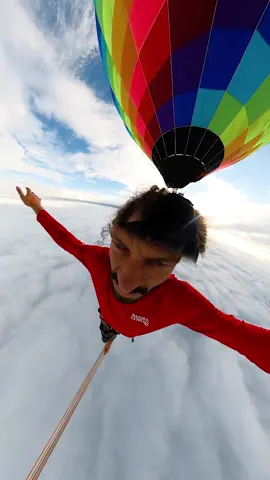 Highest slackline walk - 1,901 m (6,236 ft) by @Rafael Zugno Bridi 🇧🇷 Rafa walked between two hot-air balloons above Praia Grande in Santa Catarina, Brazil, on 2 December 2021. He crossed the 2.5-cm-wide (1-in) slackline barefoot, passing through the clouds at an altitude that took to him to twice the height of the Burj Khalia, the world’s tallest building. #slackline #hotairballoon #guinnessworldrecords 