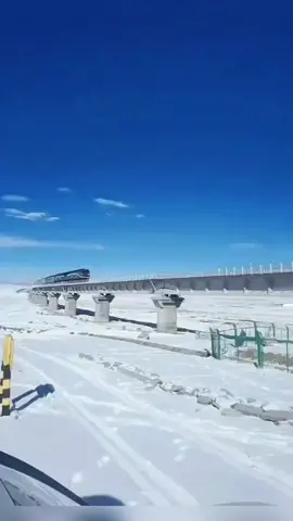 Qinghai-Tibet Railway in the Snowfield # Galloping Train # Snow-white Plateau # Long Railway Line