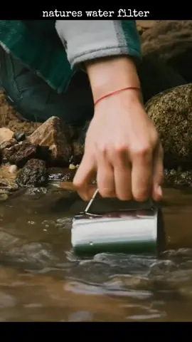filter your drinking water with nature ⚫🪨💧#creativesurvival #betterprepared #than #not #DIY #plastic #bottle #water #filter #followformore #survival #hacks #fyp #foryourpage 