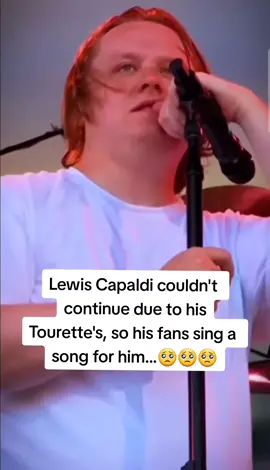 Lewis Capaldi couldn't continue due to his Tourette's, so his fans sing a song for him. #lewiscapaldi #someoneyouloved  #lewiscapaldisomeoneyouloved #music #livemusic #trending #fyp #4u #inspirational #happyvideo 