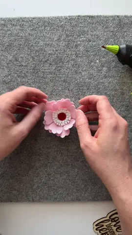 Details for this flower: Center - 4”x1/2”, straight strip rolled up Fringe - 4”x1”, folded and snip to create fringe, wrap around the center twice  Petals - 10 of petal 6B, 5 on each layer  The petal pattern is available on my website individually or as part of my Design Hub monthly membership. Only $5 a month if you join in January!  #feltflower #designhub