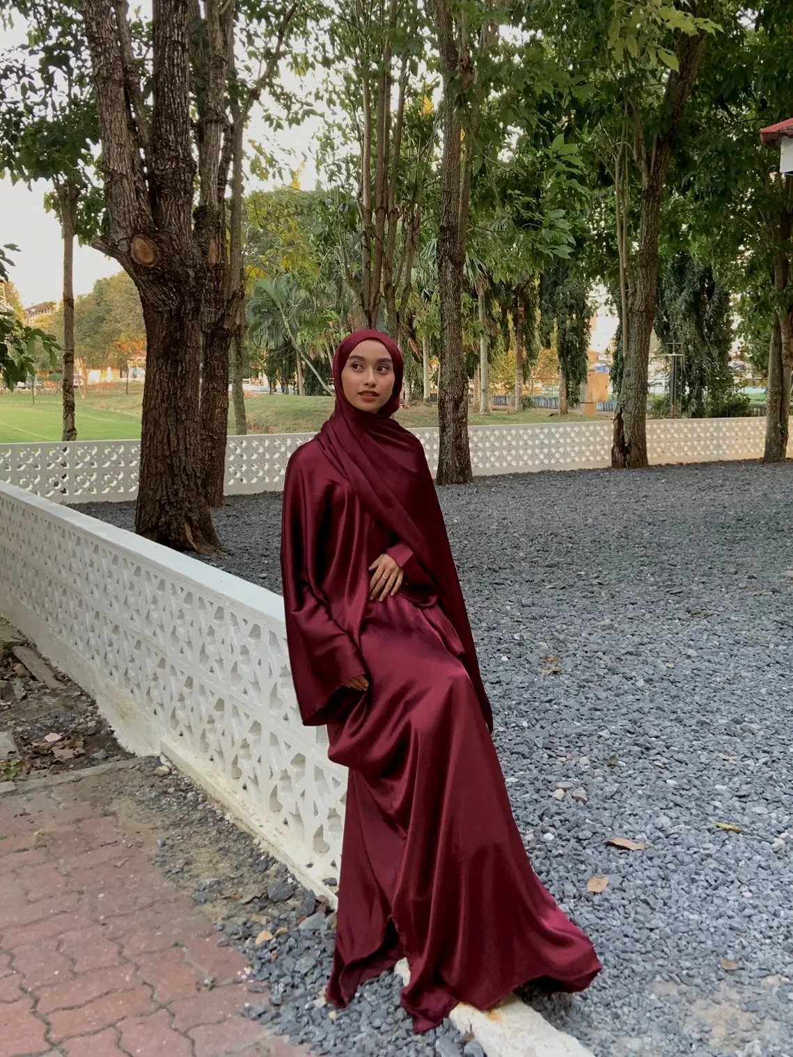 wearing satin abaya from @by.debunga in code burgundy 💌