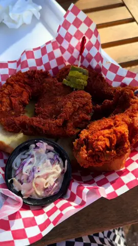 Went to go review @danghot89 after I saw @asipoftexas post about them! I’ve been in search for a good Nashville style hot chicken spot in town! I went around 1 pm on a Thursday and there wasn’t many customers. They are located in the @pink_flamingo_plant_co ! And opened 2 months ago.  What I ordered- D1 Bone in combo : Bone in Thighs ( 1 ) Drumsticks( 1 ), Wing (1 ) served with Texas toast dipping sauce and coleslaw. for 13 dollars (they were out of wings so I subbed a chicken tender, they gave me a extra thigh since they said my thigh was too small) HOT Level  Boneless chicken sandwich with fries MEDIUM level 12 dollars.  Thoughts? Man the chicken here was amazing. Easily better than Hattie Bs and Tumble 22. It was kinda similar to Howlin Rays but I think the flavor was alittle better. The dark meat chicken was so crispy and juicy and the spicy level was spicy! You can get the range from mild to Dang hot and I wanted to save my stomach so I went with hot lol. The chicken tender is white meat and was soooo moist and I loved the dang sauce! The chicken sandwich was a good price and came with fries too! The medium spice still packed a lot of flavor and I did appreciate the use of a different type of bun. the only critique is the slaw was def laid on thin and a tad more watery than I’m used to. But regardless it’s the best hot chicken sandwich I’ve had in Austin and it’s not even a competition lol. I’m shocked they do not have lines. The workers (I’m assuming owners) were really really friendly and they told me they’ve been really slow since they opened. I hope they get lots of love. Since I posted stories yesterday I’ve already have a few followers go and agree they have hearts of gold and the best hot chicken in Austin! #atx #austinfoodadventures #atxfoodtime #austinfoodie #austineats 