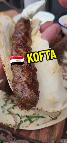 🇪🇬 Egyptian Kofta! To an Egyptian, it's always KOFTA. For my Lebanese friends, it's always KAFTA! Let me know in the comments what you call it 👇 The Smoker Baker Kofta Meat Recipe: Ingredients: 🔸️800g lamb mince (80% meat / 20% fat) 🔸️200g Beef mince (80% meat / 20% fat) 🔸️1 small to medium Onion, Grated, Discard Juice 🔸️1 Cup Parsley, Finely Chopped. The Smoker Baker Baharat Kofta Spice Mix: Ingredients: 🔸️2 teaspoons Ground Cumin 🔸️2 teaspoons Ground Corriander  🔸️2 teaspoons Ground Paprika  🔸️2 teaspoons Ground Cinnamon  🔸️1/2 teaspoon Ground Cloves 🔸️1 teaspoon Ground Cardamom  🔸️1 teaspoon Ground Nutmeg 🔸️1 teaspoon mesh black pepper 🔸️1.5 teaspoons Arabic 7 Spice 🔸️1 Tablespoon Kosher Salt * If you want to go next level, buy whole spices, toast and grind fresh!! if you do this, definitely reduce quantities of the baharat Spice mix!! You are playing on another level! ✅️ Mincing Kofta with a knife💪 1. Fine dice all the meat and refrigerate for a few hrs to firm up. 2. Using your mining knife, finely mince the meat. ✅️Butcher's Shortcut: Don't fancy hand-mincing kofta or kafta? No worries! Visit your butcher and ask for a combination of 80% lamb mince & 20% beef mince with a meat to fat ratio of 80:20 Top Tips for Kofta Success: 1. Slightly Sticky Texture: Knead the Kofta mince to create a binding texture that makes skewering a breeze. It will help the Kofta mince hold to the skewer. 2. Use water to help the kofta from sticking to your hands. It will also help shape & seal the Kofta. 3. Control the Charcoal Heat: Close the vents, wait 10 mins before you start grilling your kofta 4. JKF Technique: JUST KEEP FLIPPING! Grill the Kofta skewers 1 min per side, then flip flip every 30 sec until cooked. Even if your kofta mince mixture is not 100% perfect, this method has the power to save you😉 #kofta #koftarecipe #kebab #kebabs #thesmokerbaker 