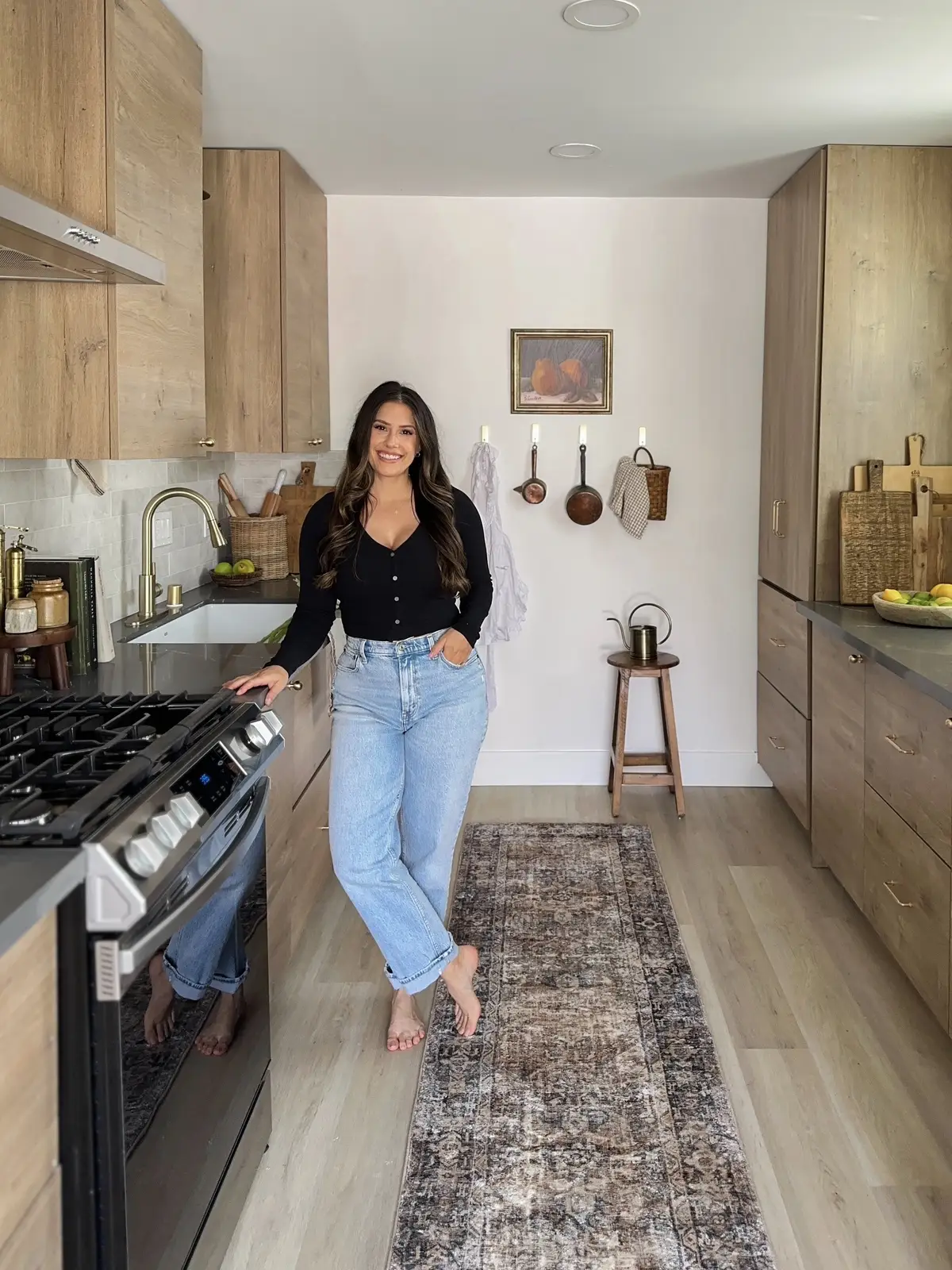 (Swipe for the before!) Designing this kitchen was so fun because it was a little outside of my comfort zone— I hadn’t incorporated a dark countertop before but it was definitely the perfect choice for this kitchen! It is a great contrast against the white oak flat panel cabinetry, and the honed marble backsplash offers the perfect transition between the two.  I added champagne gold hardware and fixtures to give this space the sparkle it needed to shine against the backdrop 🥰  I shared all the sources on my LTK 🤩