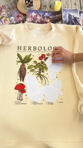Step into the magical world of Herbology with our HP-inspired sweatshirt! 🌿 Featuring enchanting illustrations of the wizarding world's most famous herbs. #HerbologyFashion #HarryPotterStyle #potterhead #harrypotter #harrypottersweatshirt #hogwartsschool #hogwartshouses #hogwartslegacy #hogwarts #hermionegranger #ronweasley #dumbledore #snape #dracomalfoy #voldemort #gryffindor #slytherin #hufflepuff #ravenclaw #herbology #herbologyclass 