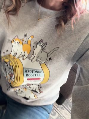 Best serotonin booster ever!! 🩷😻💊 I purchased this sweatshirt off the Tiktok Shop if you would like one too click the link 🛒 on this video its great quality too #TikTokShop #serotoninbooster #sweatshirt #catlovers 