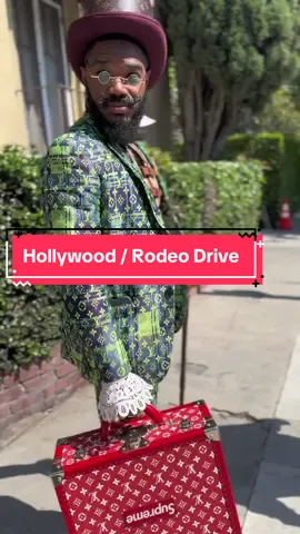 The black Willy Wonka takes the legendary supreme Louis Vuitton trunk to Hollywood and walks down the street only to end up on Rodeo Dr., Louis Vuitton down to the feet  ##willywonka##hollywood##rodeodrive##fyp##lv