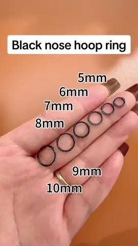 For ppl who prefer black color nose ring 😎 #ouferbodyjewelry #nosering #nosehooprings #nosepiercing #tiktokshowtime 
