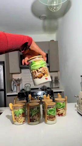 Breakfast & Lunch Jar Prep: Breakfast & Lunch Jar Prep: One of my goals this year is to stay consistent with my healthy eating and try quick and easy recipes that work for me and my busy schedule. This has been a game changer in managing my time efficiently!! The Jars are the 27 oz 4 pack under “meal prep essentials” on my Amazon storefront. **Ingredients** Fruits - Green Apples  - Cotton Candy grapes - Pineapple - Watermelon Breakfast: Overnight oats - Old fashioned Oats  - Blueberries  - Syrup of your choice . I used maple syrup - Oat milk  - Toasted coconut granola  - Chia seeds - Honey Greek yogurt  Lunch: Chicken Salad  - Chicken Thighs: clean, coat with olive oil, season with: salt, pepper, garlic powder, curry powder, thyme, smoked paprika, Cajun, & old bay. - Banza protein pasta - Lettuce  - Tomato - Parmesan cheese  - Great northern beans - Buttermilk ranch dressing (Tip: I take out the lettuce and cheese and heat up the rest of the salad items in the microwave for about 1:30 🕜. Then I mix everything together and enjoy) Inspo: @Christine Elizabeth  #fyp #foryou #mealprep #mealprepqueen #healthymeals #EasyRecipes #mealprepideas #overnightoats #saladinajar #thefinancebaddie #whatieatinaday #mondaymotivation #newyearsresolution #mealprepsundays