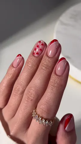Red Frenchies with a touch of hearts 💌❤️ NailzKatKat gel polishes are so pigmented and the best for nail art 😍 Rose Quartz Rubber Base Lady In Red Gel Polish French Tips White Gel Polish Silver Gel Polish  Link in Bio • BEELO10 • affiliate  #gelpolish #gelmanicure #gelnails #diynails #ValentinesDay #valentinesnails #nailtutorial #nailtok #geltutorial #naturalnails #uñasbonitas 