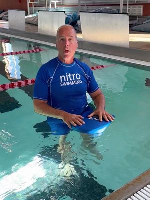 Here's how to utilize the kick board to practice swimming on your back.