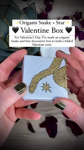 ✨Origami Snake and Star Valentine Box🐍In place of a Valentine card this year, I’ve decided to make a paper Valentine box, into which I’ll slip Valentine notes and tiny gifts✨I’ve followed instructions for the traditional origami masu box, and ornamented it with my own drawings of snakes and stars that coil all around and inside the box🐍 #valentine #valentines #ValentinesDay #origami #papercrafts #box #bemine #snakes #crafting #DIY #handmade