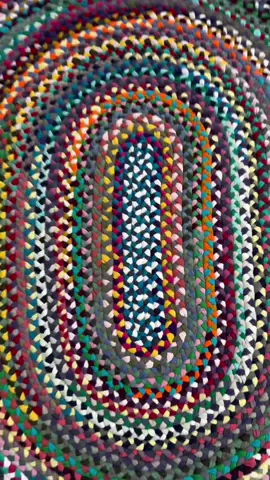 DIY braided rug using recycled tshirts #braidedrug #diydecor #recycledmaterials #diyproject #recycled #tshirt #fyp 