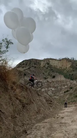 The drop was still scary even with the balloons holding me up 😅 #bikehacks #mountainbike 