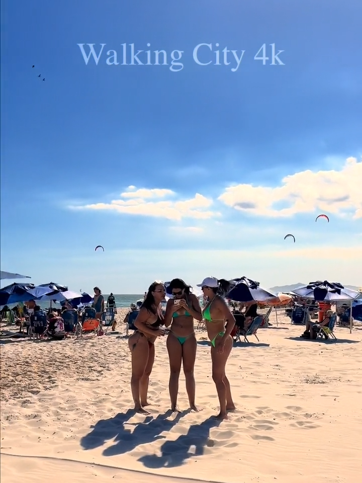 🌴 Summer in Rio de Janeiro, Brazil. Walking on one of the most famous beaches in Rio de Janeiro in Brazil, Praia da Barra da Tijuca is the preferred place for those who want to relax and cool off on the hottest days during the summer. I walked on the sand to show what a Sunday morning is like, follow the video with many beautiful people in bathing suits, beautiful women having fun posing for photos, and enjoying the day. Barra da Tijuca is a neighborhood in the West Zone of the municipality of Rio de Janeiro, Brazil. The neighborhood is part of the administrative region of Barra da Tijuca. It has, as neighboring districts, Itanhangá, Camorim, São Conrado, Jacarepaguá, Recreio dos Bandeirantes, Curicica and Joá. Like Jacarepaguá, it is one of the neighborhoods that grew the most in Rio de Janeiro at the turn of the 20th century to the 21st century; went from 24,126 inhabitants in 1980 to 394,037 inhabitants in 2020. Currently, it is considered a financial, gastronomic, hotel and entertainment center of the state capital. It has been the target of migration from other neighborhoods in the municipality. It is estimated that Barra's population will double by 2030. In 2020, its quality of life index was evaluated at 0.972, reaching the 1st place in Rio de Janeiro, among 126 evaluated neighborhoods. #foryou#fyp#fy#beach#brasil#riodejaneiro#rio#carnaval#rj#carioca#barradatijuca #Summer#girls#beauty#playa#foryoupage#funny#bikini#viral#video#best#walk#4k#turismo#travel#happy#sea#sunset#sun#sports#kite#women#trending#party#paradise#music#life#vibes#vacation#beachlife