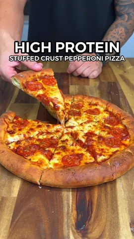 Easy High Protein Stuffed Crust Pepperoni Pizza🍕 81g Protein! 💪🏼🔥 This recipe is the perfect lower calorie, higher protein & healthier alternative that is guaranteed to satisfy your cravings while helping you lose fat & build muscle! (Total Macros) 883 Calories 63gC | 25gF | 81gP Ingredients: 110g Self Raising Flour (Vetta Smart Self Raising Flour - can be substituted for plain all purpose flour, if doing so add 1.5 tsp of baking powder) 100g Low Fat/Fat Free Greek Yoghurt 1 Tsp Italian Herb Seasoning 1 Tsp Garlic Powder 1 Tsp Salt 7g Nutritional Yeast (optional) 3 Sliced Light Mozzarella Cheese Sticks 80g Pizza Sauce/Marinara 75g Low Fat Grated Cheese (Bega 50% Less Fat Grated Cheese) 30g Thinly Sliced Mini Pepperoni (Sultans Beef Pepperoni - regular pepperoni or turkey pepperoni can be used) Don't forget to check out my recipe eBooks with 200+ easy & delicious recipes like this one 📖👨🏻‍🍳 IMPORTANT NOTES: If you have trouble forming the dough due to it being  sticky, start by initially slowly adding the flour first followed by adding the yoghurt, mix & add more flour if needed until you reach a consistency you can work with. Depending on the brand some yoghurts have more or less moisture which can cause it to be sticker. Once you have formed the dough ball either place it on a lightly floured surface or parchment paper/baking paper before rolling it out to avoid it sticking. (lightly flour your rolling pin too) Roll the dough out as big & thin as you can but make sure to do it gently & slowly to prevent it from breaking. #pizza #pepperoni #highprotein #highproteinmeals #lowcalorie #Fitness #Foodie #weightloss #EasyRecipe #healthyrecipes 