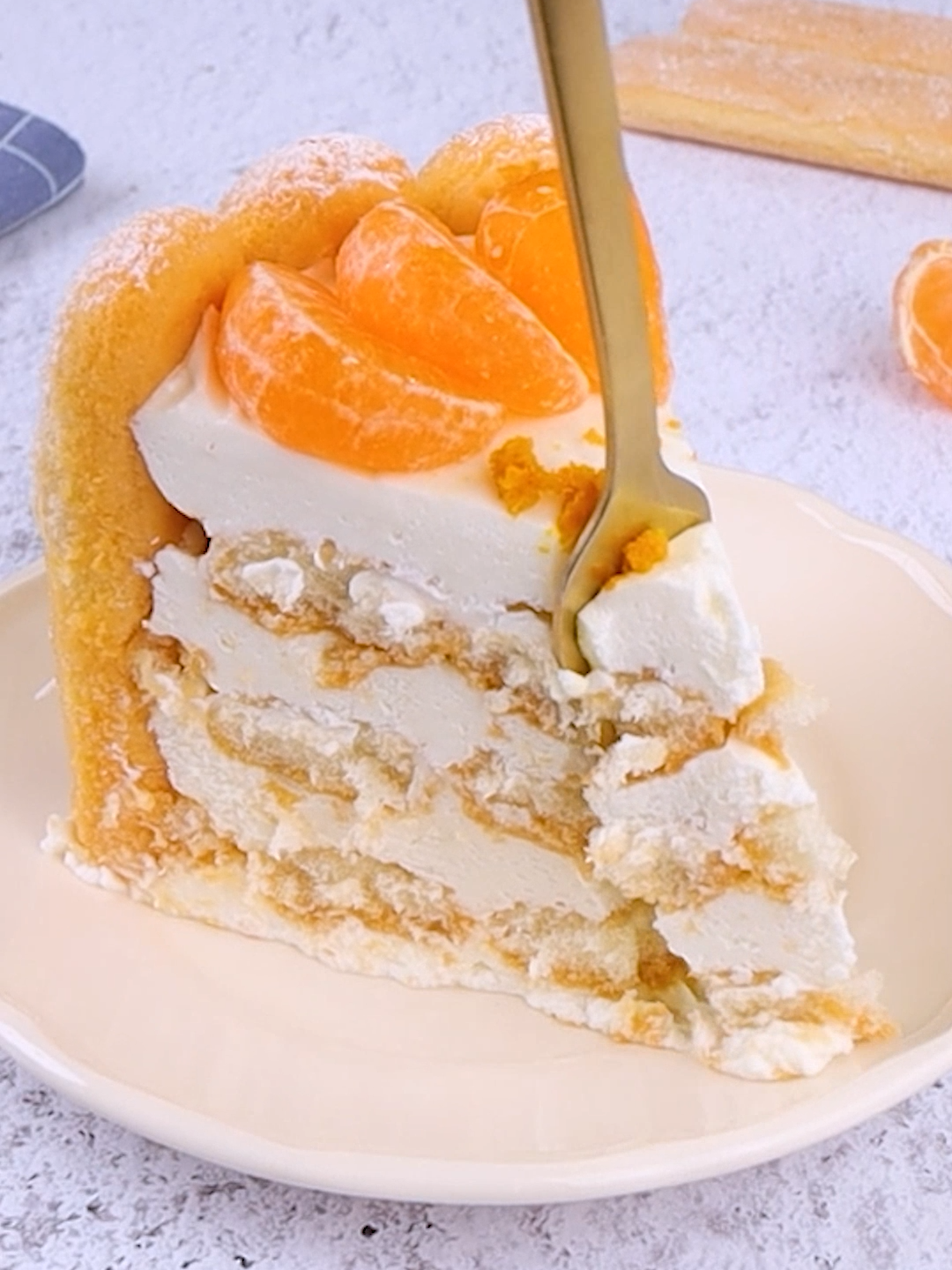 Zesty, fragrant and beyond delicious! ✨ If you have some tangerines at home this is what you need to make 🍊❤️ 👉INGREDIENTS 420g of tangerines 320g of ladyfingers 320ml (1 1/4 cups) of heavy cream 90g (3/4 cup) of powdered sugar 260g (1 1/4 cups) of mascarpone Tangerines Tangerine (zest) Powdered sugar   👉METHOD 1. Peel the tangerines and transfer them to the food processor. Mix and then sift them to obtain the juice. 2. Dip in tangerine juice lady fingers (only the bottom part). 3. In a bowl add the heavy cream, powdered sugar, and mascarpone and mix with an electric mixer to obtain the cream. 4. Place the mold on the plate and add one layer of the cream on the bottom. Arrange lady fingers around the circle. 5. Place one layer of the ladyfingers in the middle and one layer of the cream. Repeat the process to the top. Transfer to the fridge for 2 hours. 5. After time has elapsed decorate the cake with tangerines, tangerine (zest), mint leaf, and powdered sugar. Cut a slice and serve. Isn't it delicious? 😋👇 #cookistwow #cookistrecipe #recipes #easy #quick #fun #delicious #cooking #baking #tasty #homemade #foodie #foodlover #foodblog #yummy #foodtok