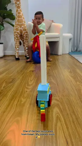 This is how I keep my toddler engaged 😅#toddlersoftiktok#kmartfinds#dominostrainblock#happybaby#happymomma🧡 