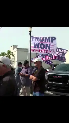 ‘YEAH BOY!’ Trump fans with ‘TRUMP WON’ (he didn’t) ‘Biden NOT President’ (he is) flags go nuts when motorcade pulls into court.  #politics #election #election2024 #usa #america 