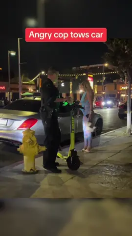 Angry LAPD officer Jason Haberkorn curses at woman before towing her car. #hollywood #copwatch #policeoftiktok #lapd #police #copsoftiktok 
