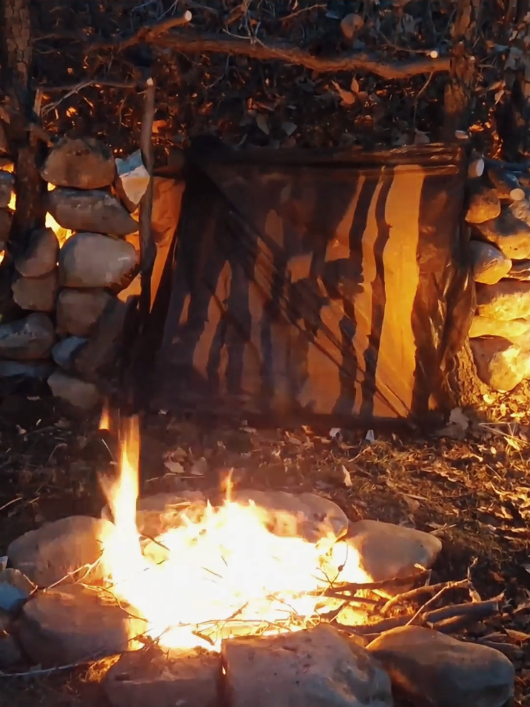 Solo shelter with stone and wood #bushcrafting  #build  #camping  #ourdoor  #shelter  #survival  #viral  #fyp  #camp  #craftingvisionary