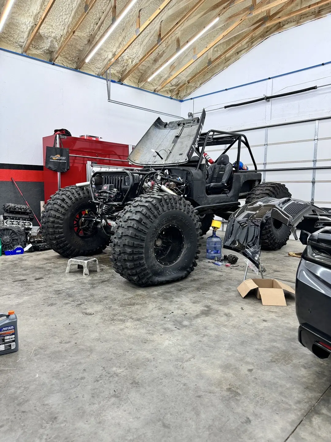 After destroying the motor in the madmax jeep at LS Fest East last September in Bowling Green, Kentucky @alhashimigarage is pulling the motor and sending it off to the machine shop for some major upgrades! #jeep #truck #reels #shorts 