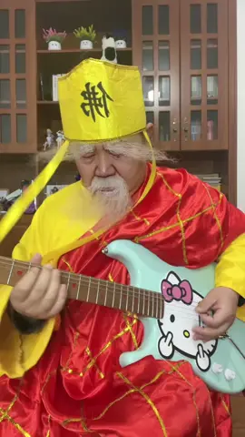 just an old Chinese man playing pirates of the Caribbean on a hello kitty guitar 