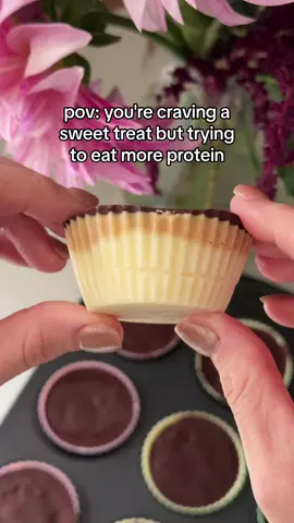Protein Yoghurt Cups 🥜  🍫  Try these Protein Yoghurt Cups for a delicious and healthy snack option! Ingredients: * 2 cups Greek yoghurt * 2 scoops vanilla protein powder * 4 tbsp peanut butter + 2 tablespoons boiling hot water * 100g dark chocolate + 1 tsp coconut oil Instructions: * 		In a large bowl, mix together yoghurt and protein powder. * 		Add 12 muffin liners to a muffin tray. Evenly distribute yogurt amongst each liner, then add a layer of peanut butter mixture. Place into the freezer for about an hour.  * 		Melt chocolate and coconut oil in the microwave in 30-second increments until smooth. Remove yogurt cups from freezer and pour chocolate on top. Freeze again until completely set. Enjoy these protein-packed treats guilt-free! #healthysnack #highproteinrecipes #healthydessert #highprotein 