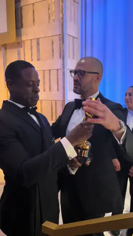 Sterling K. Brown asks to hold Cord Jefferson’s Oscar at the Governor’s Ball. “Couldnt have done it without you,” Jefferson says. #oscars #cordjefferson #sterlingkbrown #americanfiction 