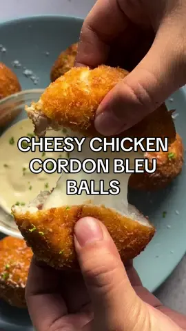 Cheesy Chicken Cordon Bleu Balls 😋😋 a forever go to snack! What’s yours? Let us know ✨ Ingredients For the Chicken Cordon Bleu Balls: * Ham slices *  Euro Chef Mozzarella Cheese Block, as needed * 1 kg ground chicken breast, seasoned with salt and pepper For the Breading: * 1 cup Flour  * 1 piece Egg * 1 cup Breadcrumbs * Oil, for deep frying Steps:  1. Cut the ham into 3 equal sizes (length-wise). 2. Place the mozzarella cheese on top of one slice and tightly roll. 3. Place a portion of ground chicken breast on your palm and shape it into a ball. Create a shallow hole in the middle of the ball and place ham and cheese roll. 4. Gently cover the ham and cheese roll to enclose it, shaping it into a ball, and set it aside. Repeat the process for the remaining ingredients. 5. Dredge each roll in flour, dip in egg, then coat with breadcrumbs. 6. Deep-fry for 6-8 minutes or until cooked and golden brown. Drain excess oil. 7. Let the bites cool slightly before serving. Pair them with your favorite dipping sauce. #eurorich #eurorichcooks #cordonbleu #mozzarella #lecordonbleu #cordonbleurecipe #cheesepull #cooking #cheeseasmr #foodieph #foodph #snackideas #snacks #recipeideas #foodporn #fyp #fy #foryou 