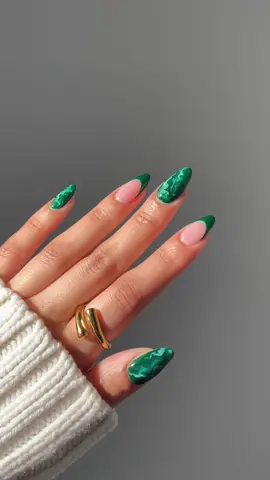 Spring isn’t just for pastels 🤭💚 this technique is always so much fun!! p.s. if you try this one, make sure to apply the polish in super thin layers to ensure proper curing ✨ Using @GELCARE®  • Bare BB Creme • Emerald • Lagoon • French Alps • Lightsaber Green code ‘glossytipped’ to save 💚* ring @Bohomoon code ‘glossy10’* *affiliate _____ #marblenails #nailideas #springnails #2024nails #nailinspo #clawclip #acetateclips