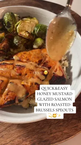 Quick and easy honey mustard glazed salmon with roasted brussels sprouts 💫🍯✨ fast enough for you to make after work and get your booty on thr couch for the bachelor at 7!!  Ingredients: •2 salmon filets •1/4 cup Dijon mustard •2-3 tbsp @Mike’s Hot Honey  •zest of 1 lemon •juice of 1/2 lemon •Big dash of smoked paprika •big dash of onion powder •salt and pepper •@Primal Kitchen Foods avocado oil •fresh Brussels sprouts, chopped in half  •@NearEastProducts rice & quinoa mix  •@Poppi for the good vibes  Salmon: -in a bowl, add Dijon, honey, lemon zest, lemon juice paprika, onion powder, salt and pepper and mix well -score salmon filets -coat both sides of salmon in the marinade and let marinate for 10-15 minutes, or longer if you have time -line air fryer with tin foil and transfer salmon and marinade  -airfry at 400° for 14 minutes -spoon warm marinade over the salmon  Roasted Brussels sprouts: -add Brussels, onion powder, salt and pepper, and a drizzle of avocado oil to a zip lock and shake until evenly coated -airfry at 400° until crispy  Follow directions on near east mix :)  #cookingvideo #DinnerIdeas #healthydinner #mealideas #cookwithme #cookingvlog #healthymeals 