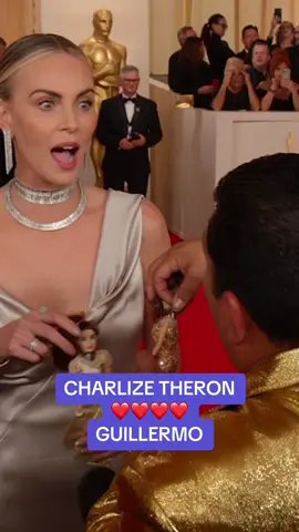 Guillermo finds #CharlizeTheron on the #Oscars Red Carpet! 