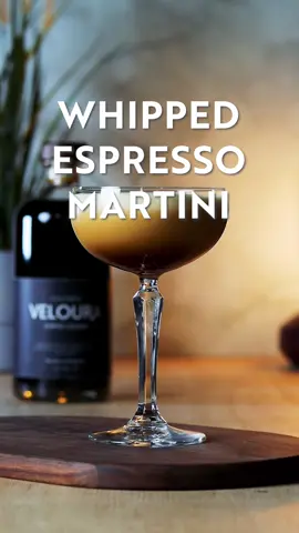 The Whipped Espresso Martini What’s do people love more than a classic Espresso Martini? One covered in as much froth as possible of course! If that’s you then this is the reel for you!  This frothy little number uses the magic of reverse dry shaking to generate a thick, dense cream like foam on the drink. This is where you shake with ice as usual, then strain out the ice and shake again. The second shake whips air into the drink and creates a decadent foam.  Recipe. 55ml Fresh Espresso 45ml Landlocked English White Rum 25ml Veloura Cold Brew Liqueur 15ml Brown Sugar Syrup Add everything to a shaker followed by ice. Shake for around 20 seconds before straining out the ice and shake again. When you can’t hear the little shards of ice in the liquid it’s ready. Strain into your favourite glass and enjoy! Leave the beans for the coffee grinder!  #cocktails #spirits #englishdistillery #englishrum #englishspirits #distillery #miltonkeynes #fennystratford #drinkslovers #cocktaillovers #coffee #liqueur #coffeeliqueur