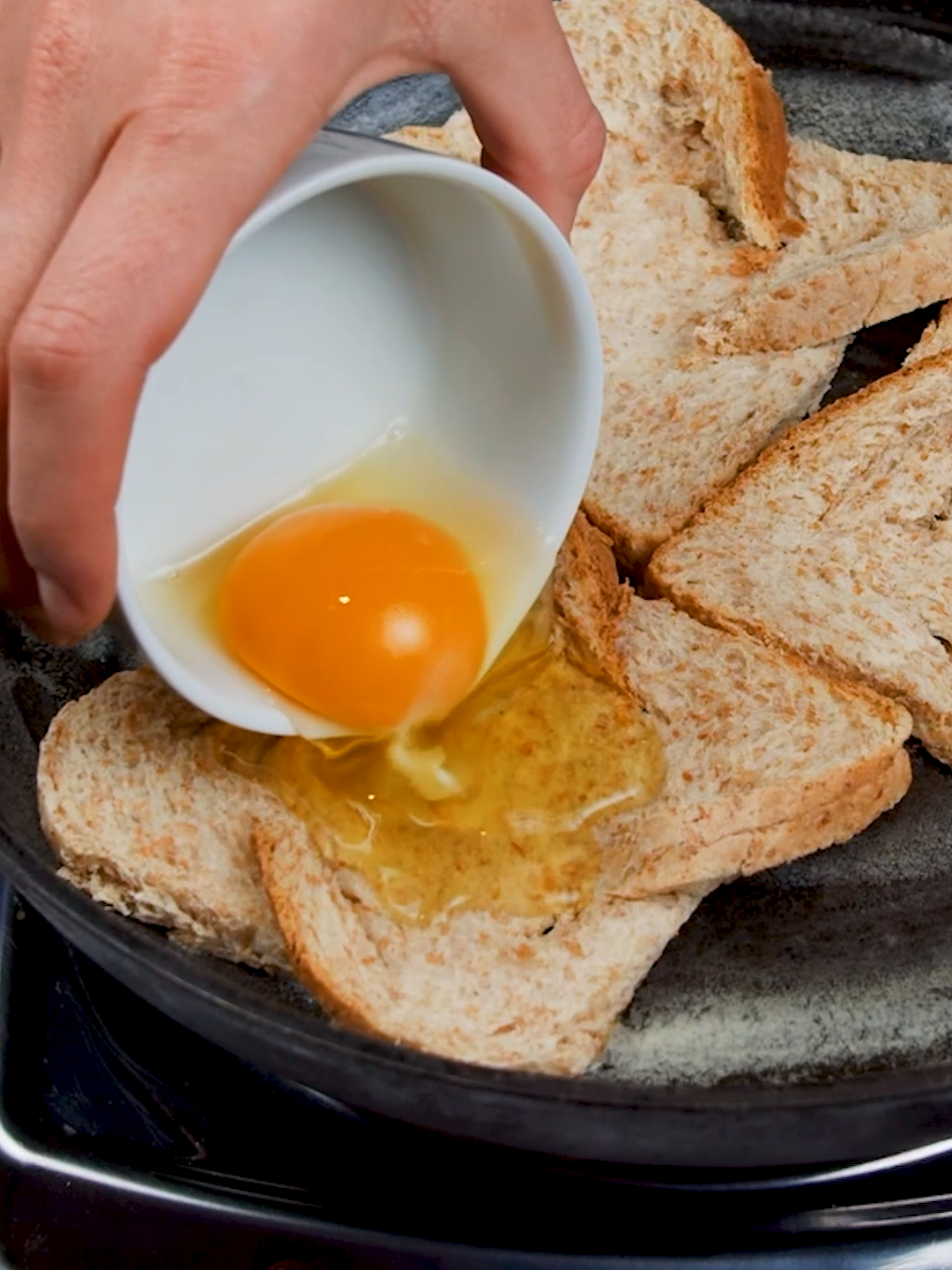 Pour the #eggs directly over the #bread slices and make fancy toast in no time! Your whole family will love them 😍 👉INGREDIENTS 6 slices of bread 6 eggs Salt and pepper Butter Chopped parsley   👉METHOD 1. Make slits on the sides of each toast bread slice. Fold slits as shown in the video. Press the center part of the bread to make some room for the egg. 2. Melt butter in a pan placed over medium-low heat. Pour egg over the bread and season with salt and pepper. 3. Cover the pan with a lid and cook on low until the egg white is set. Sprinkle parsley on top. What would you add to them? 😋👇 #cookistwow #cookistrecipe #recipes #easy #quick #fun #delicious #cooking #baking #tasty #homemade #foodie #foodlover #foodblog #yummy #foodtok