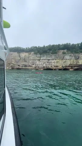 Our boat follows you while paddling and is ready to assist if necessary 😎🚢 #paddlepicturedrocks #picturedrockskayaking #kayaktour #munisingmichigan #picturedrocksnationallakeshore 