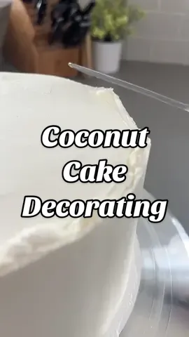 Let's decorate a coconut cake with coconut buttercream frosting. No fancy designs here. Let's just cover the whole thing in coconut! Recipe linked in my profile and on cakemehometonight.com! #cakedecorating #coconutcake #cake 