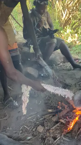 Hadzabe tribe hunting cooking Bird 