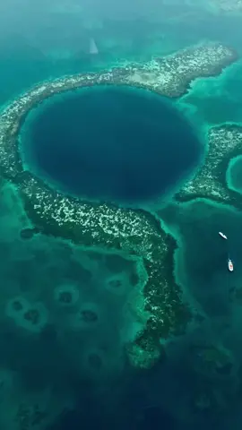 The Great Blue Hole, a natural wonder that has captivated the hearts of many.💙 #TravelBelize 📹: @larissagrau
