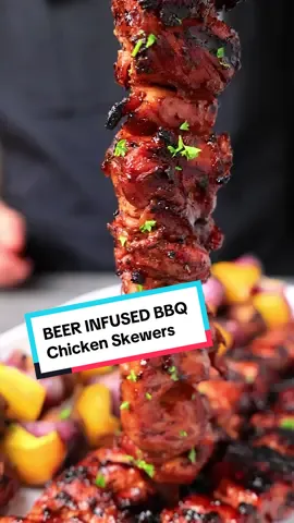 BEER & BBQ PAIRING: BBQ Chicken Skewers with Beer Infused BBQ Sauce and Munich Dunkel. Episode 5, Beer and BBQ Pairing Series. These BBQ Chicken Skewers with Beer Infused BBQ Sauce are savory, sweet, and extremely flavorful. Marinated in a homemade beer-infused BBQ sauce made of brown sugar and honey, savory Worcestershire and tomato sauce, and a Munich Dunkel beer to add a delicious depth. Pair this chicken with a Munich Dunkel or other dark malty lager. The full recipe for this is below and the Munich Dunkel recipe is on the website.  INGREDIENTS BEER INFUSED BBQ SAUCE *Makes 3 cups sauce + 1/4 yellow onion, diced + 3 TBSP unsalted butter + 12 oz Dunkel (reduce by half) + 1/4 C Worcestershire sauce + 1 can (15 oz) tomato sauce + 1/4 C butter + 1.5 C brown sugar + 1/4 C honey + 1/2 tsp black pepper + Salt to taste + 2 lbs chicken thighs DIRECTIONS + STEP 1: BBQ SAUCE Sautee the onions with butter until translucent. Add a little beer to deglaze, then slowly add the remaining beer. Simmer until the volume decreases by half. Add the remaining ingredients and return to a simmer for 10-15 minutes until thickened. Using an immersion blender, blend the sauce until smooth. + STEP 2: MARINATE Once the BBQ sauce has completely cooled, add 1 cup to a gallon Ziploc bag. Chop the chicken into large chunks, add to the Ziploc bag, and let it marinate in the fridge for 2-4 hours, or at least 30 minutes.  + STEP 3: GRILL Put the chicken onto the skewers and grill over medium heat. Baste with extra sauce a few minutes before removing from the grill. The chicken is done when the internal temperature reaches 170°F. + STEP 4: SERVE Serve with BBQ'd veggies and a Munich Dunkel. #bbqchickenskewers #bbqchicken #munichdunkel #beerpairing #beerandbbq #casitamaderecipes 