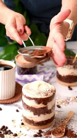 RECIPE: https://www.theconsciousplantkitchen.com/tiramisu-overnight-oats/  . These Tiramisu Overnight Oats are a creamy chocolate overnight oats recipe with a touch of coffee and yogurt vanilla cream layers. It tastes like your favorite Tiramisu dessert but much healthier, full of fiber and plant-based proteins from oats. #overnightoats #oatslovers #coffeeaddict #healthybreakfast #tiramisu