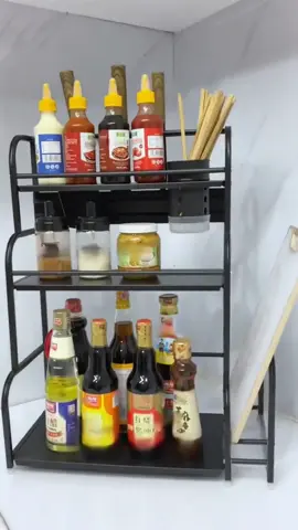 The kitchen spice storage rack can not only store spice jars but also chopsticks, knives and cutting boards. #rotatingstoragerack #kitchen #householdproducts #Storagerack #condimentstoragerack 