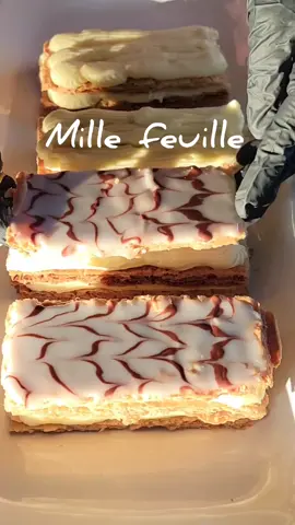 Mille Feuille, or thousand sheets very delicious french dessert. Ingredients: Puff pastry Vanilla pastry cream: 4 egg yolks 150 g sugar 1 tsp vanilla extract 35g corn starch 400 ml hot milk  Vanilla an chocolate icing: 3 cups of powdered sugar 1 tsp vanilla extract 1/3 cup of milk (add milk as needed) Take some of it and add 1/4 cup of cacao powder to make the chocolate part. #asmr #cookingvideo #homemade #millefeuille #dessert #tasty #fyp #viral #asmrsounds #asmrcooking #nomusic #recipes #kitchen #sunlight #sweets #sweet #pastrycream #puffpastry #eating #easy #EasyRecipe #tunisia #newyork #food #Foodie #viral #fy #explore #tiktok #reels #french #foodtricks  #cooking 