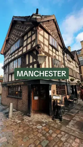 Strollin through Manchester UK. 🇬🇧♥️ Deansgate Street, Manchester Cathedral, The Old Wellington, best Indian lunch at This & That, and 20 Stories for views. #unitedkingdom #uk #manchestercity #british #fyp #foryourpage #traveltok #traveltiktok #travel #manchester #britain #brit 