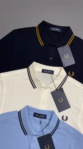 Fred Perry M3600 Series Twin Tipped Polo Authentic The Twin Tipped Fred Perry Shirt. Made from our classic cotton piqué, in a contemporary adaptation of Fred’s famous streamlined fit. Available in a diverse range of colourways-each with their own unique story. Color: • Navy / Dark Caramel / Dark Caramel • Ecru / Dark Graphite / Dark Graphite • Sky / Black / Black #fredperry #fredperryshirt #fredperryindonesia #fyp 
